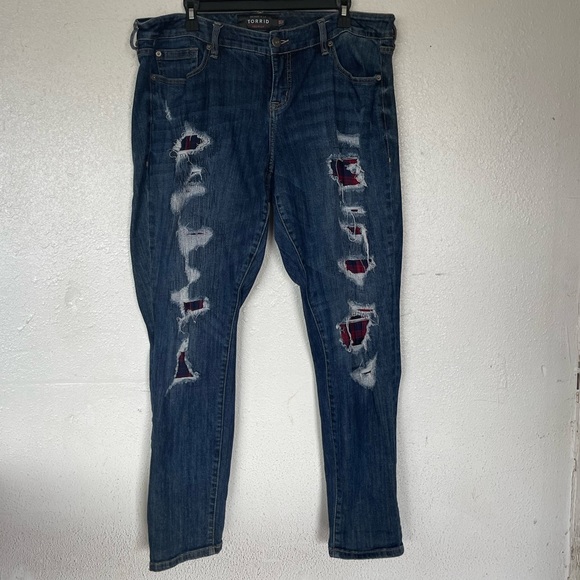 torrid Denim - Torrid patched distressed boyfriend jeans.